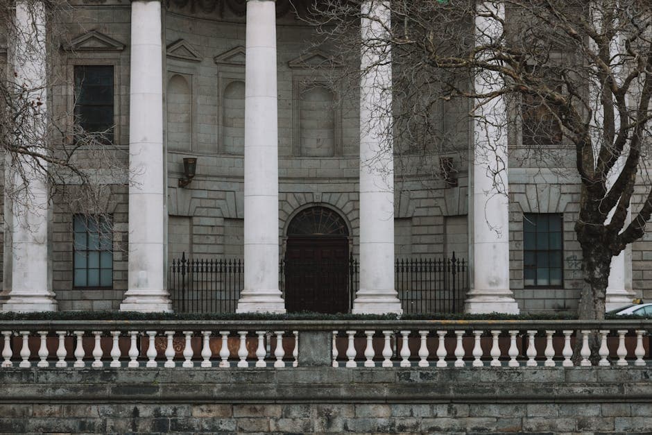 Elegant neoclassical facade of Dublin's Four Courts with iconic white columns.