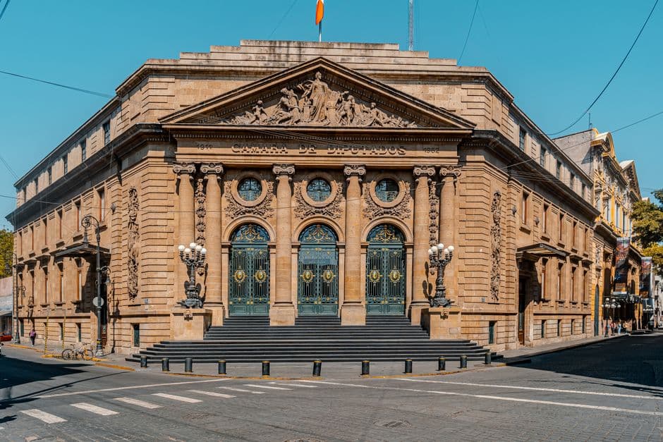 Stunning facade of a historic government building in Mexico City, showcasing classical architecture.