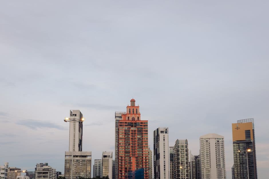 Dramatic view of Panama City's skyline with modern skyscrapers against a soft sky.