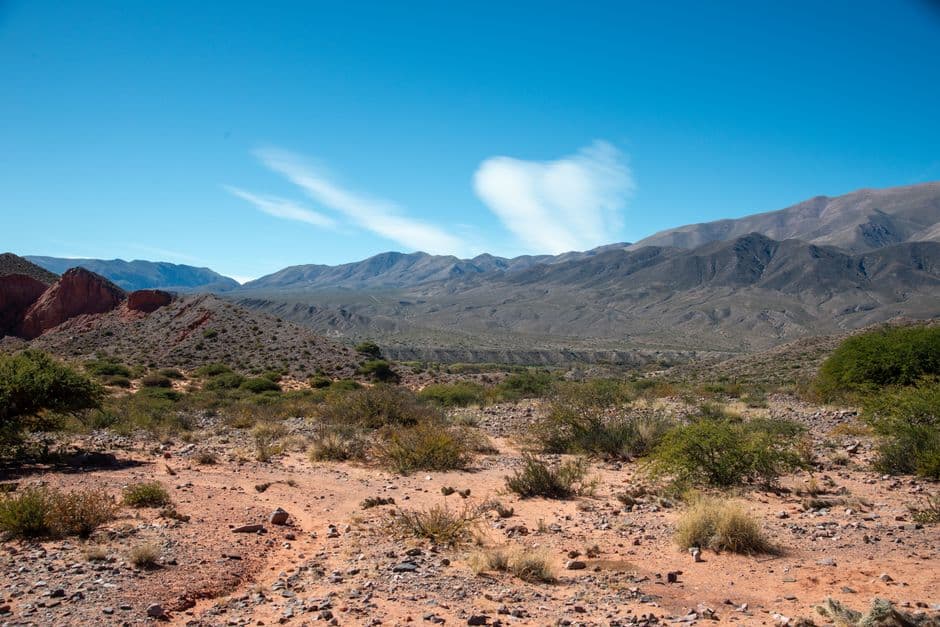 Breathtaking arid landscape of Jujuy Province with mountains and blue sky in Argentina.