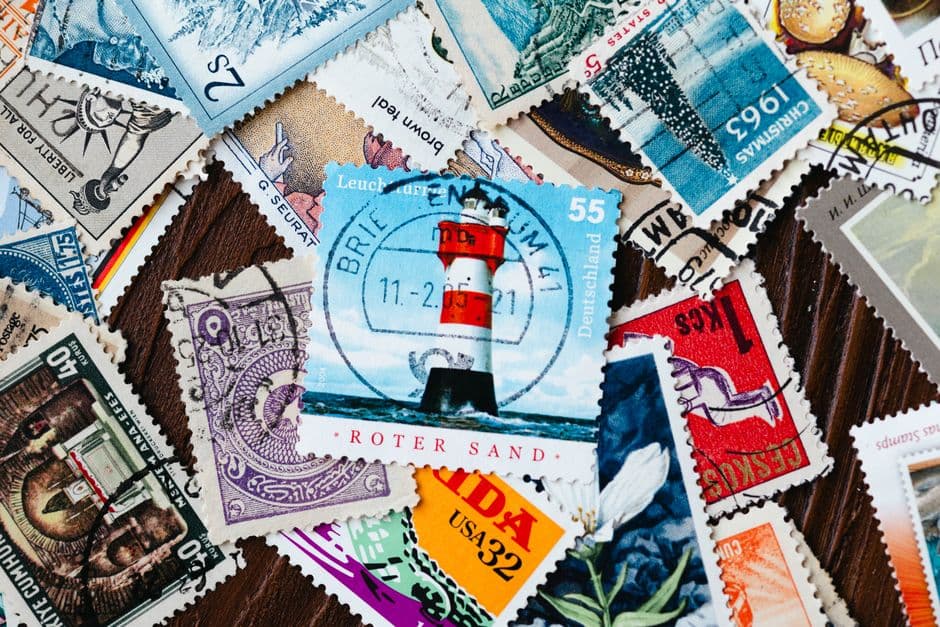 A vibrant assortment of international vintage postage stamps, highlighting various designs and histories.