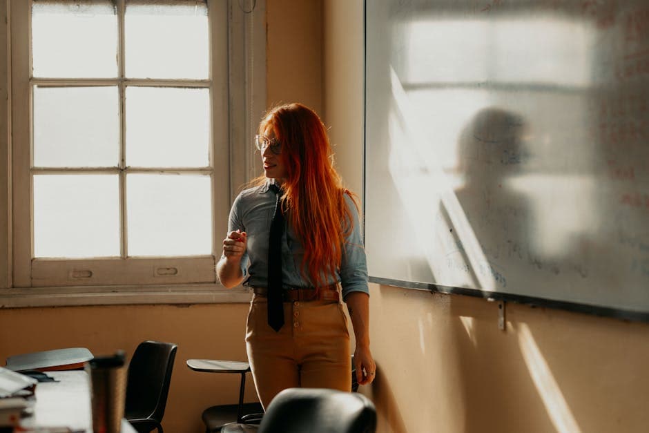 A lecturer stands by a whiteboard during a classroom lecture in Buenos Aires.