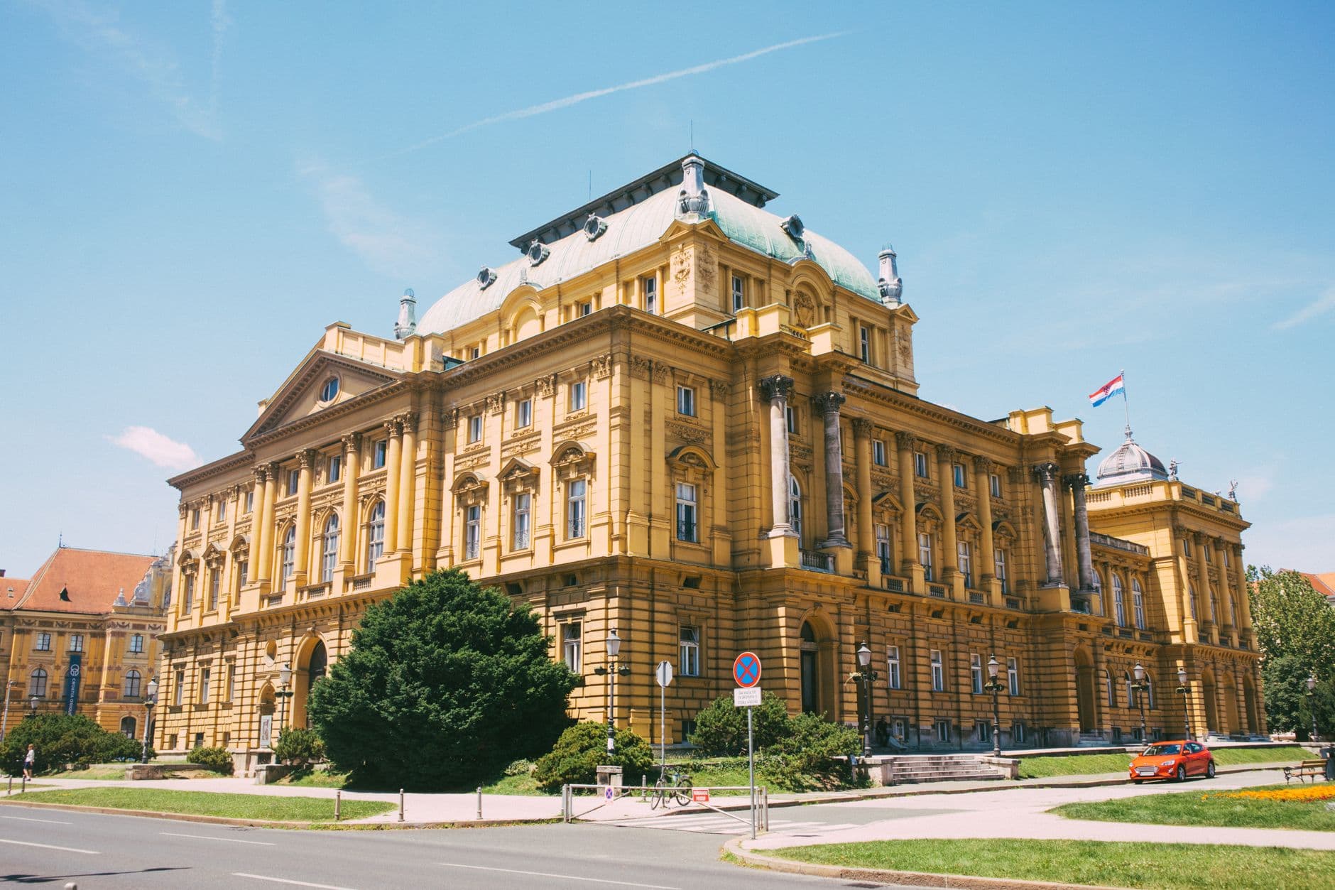 Scenic view of the Croatian National Theatre in Zagreb on a bright summer day.