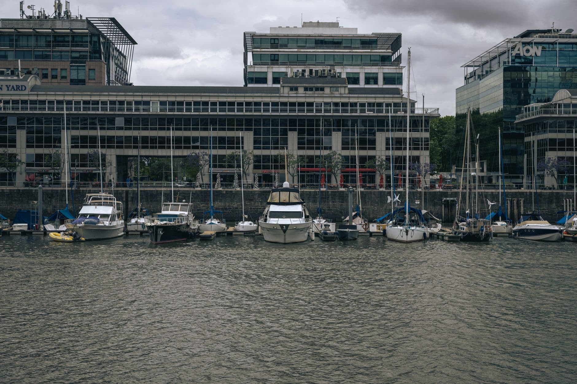 View of yachts and modern buildings in Puerto Madero, Buenos Aires, Argentina.