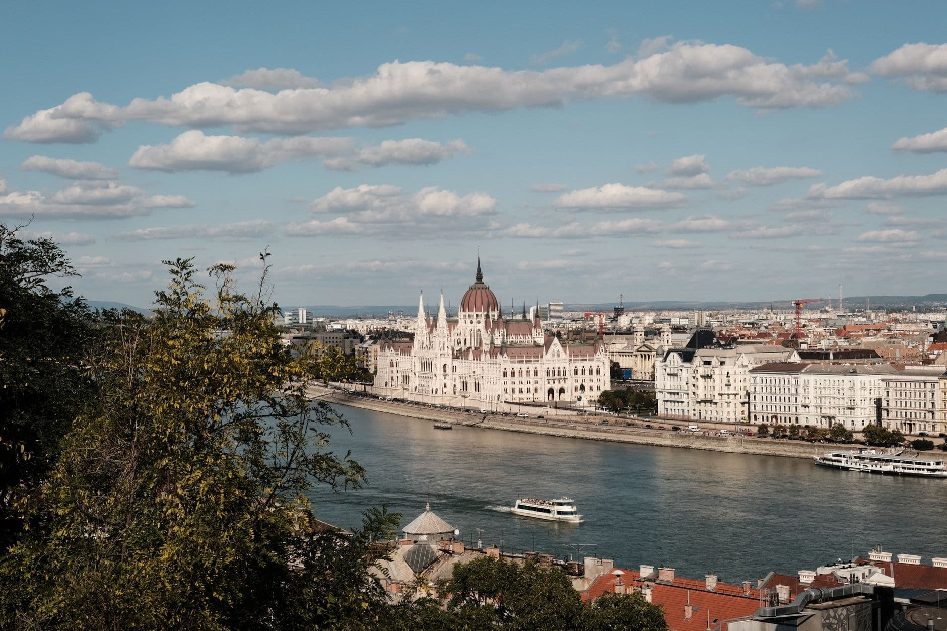A breathtaking view of the Hungarian Parliament Building along the Danube River in Budapest, Hungary.
