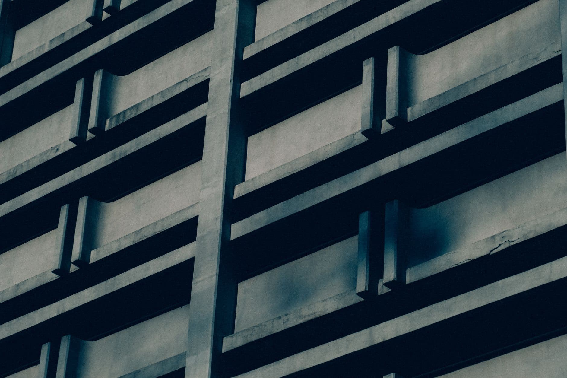 Close-up of a modern building facade showcasing geometric patterns and contemporary design.