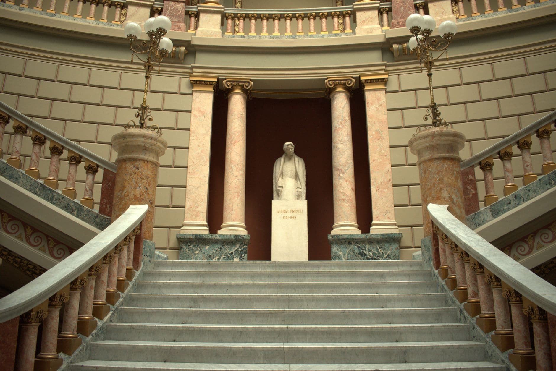 Historical staircase and statue at the George Enescu Museum, Bucharest.