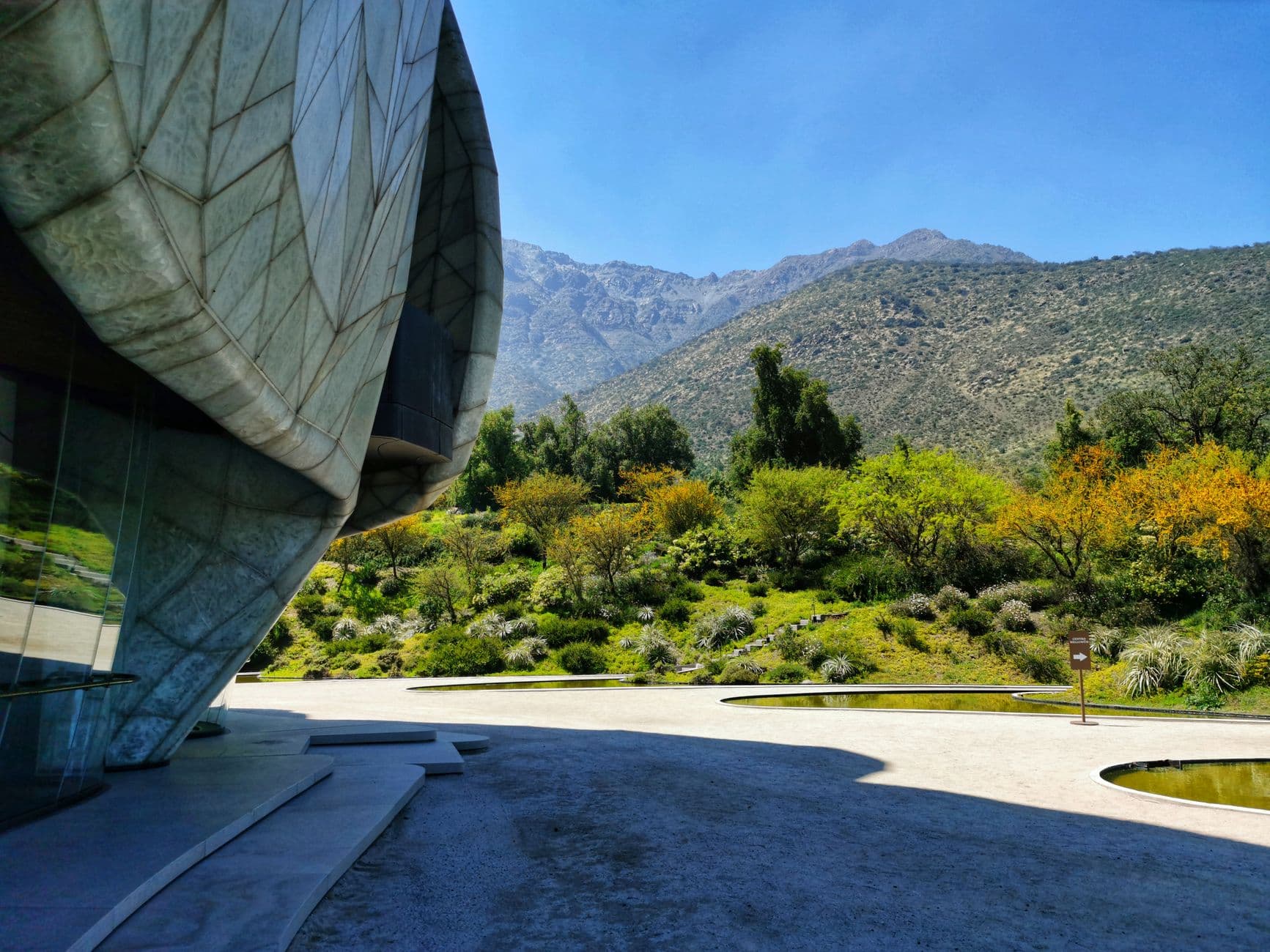 Striking modern architecture set against Chile's Peñalolén natural backdrop.