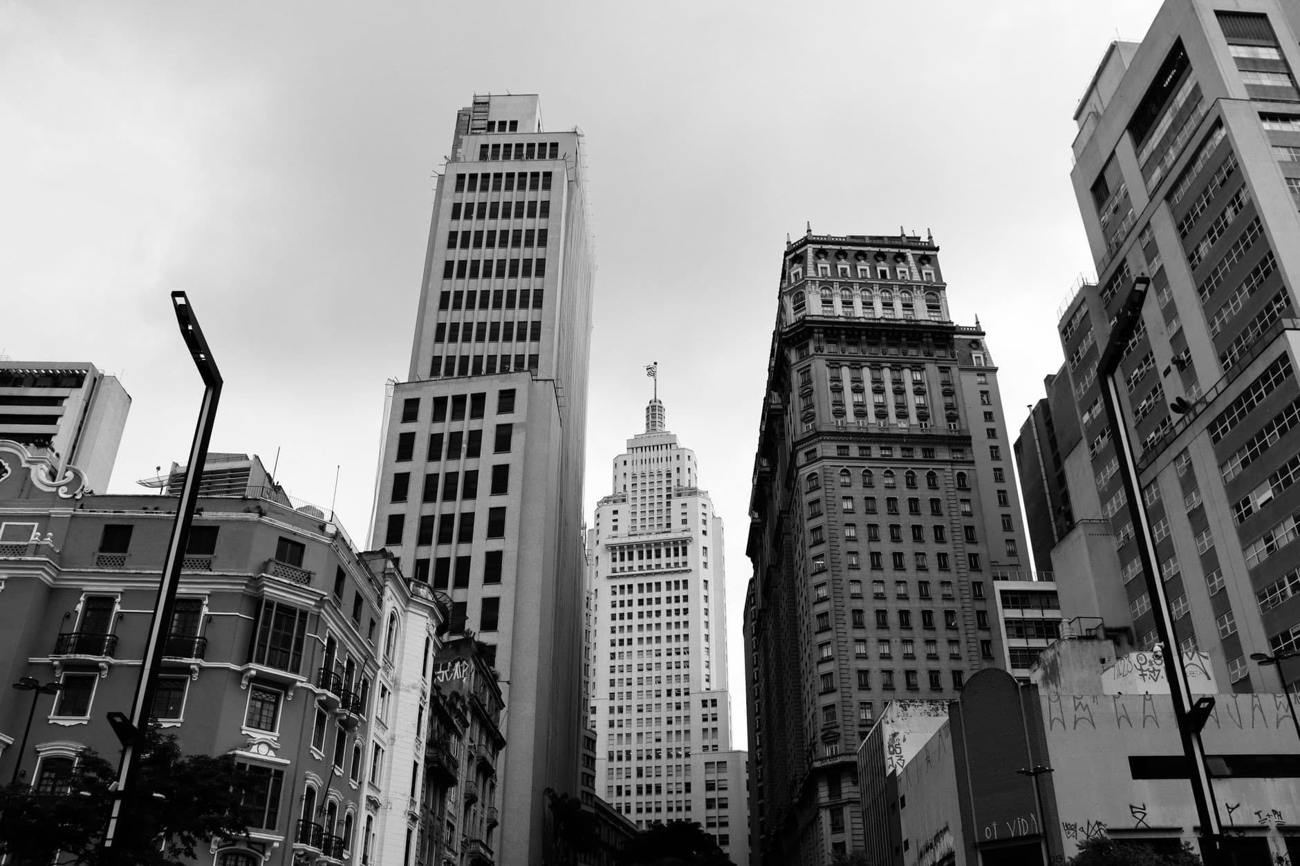 Black and white photo capturing historic skyscrapers in São Paulo's city center.