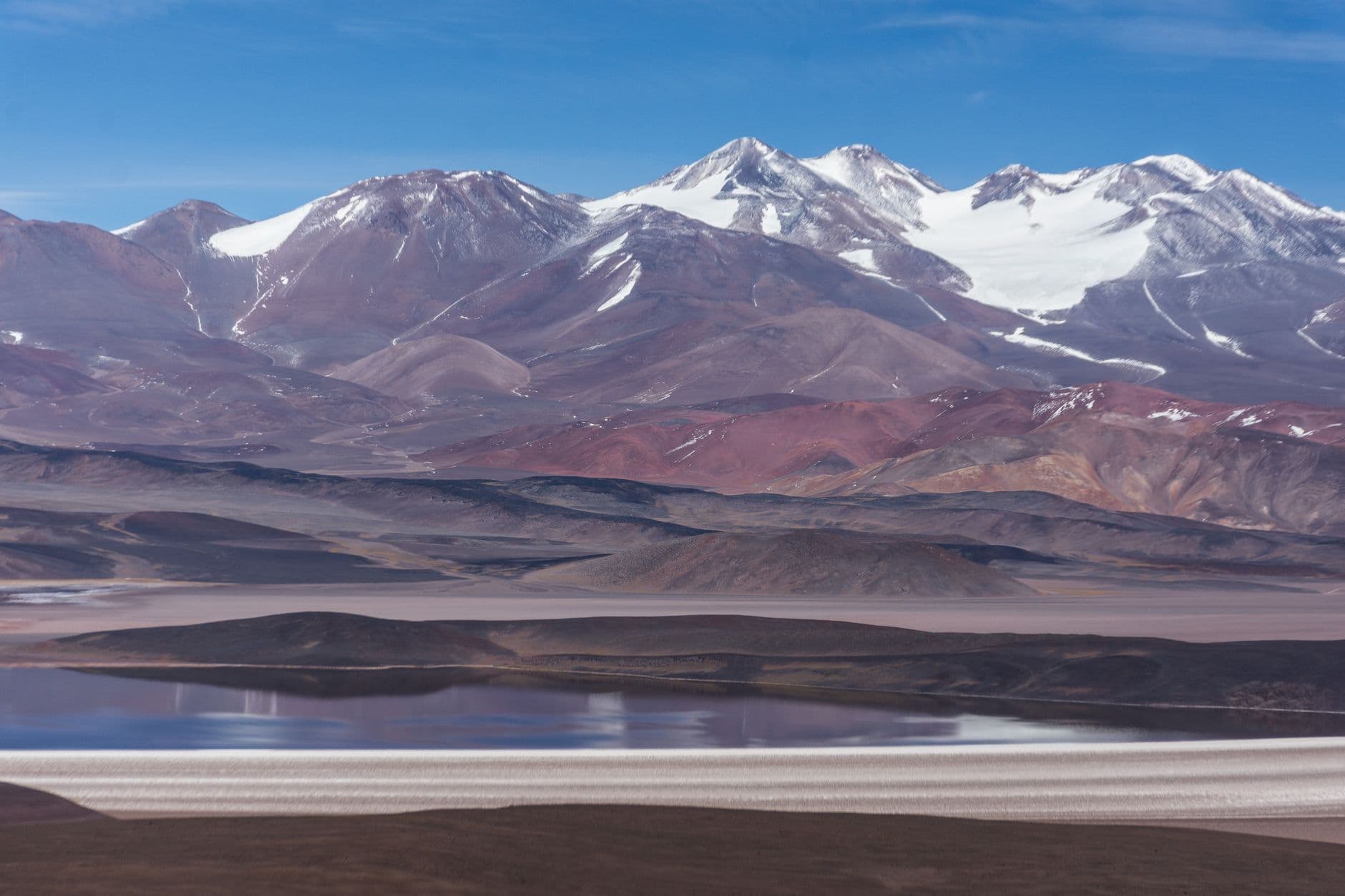 Breathtaking view of the Andes mountains with colorful geological formations in Catamarca, Argentina.