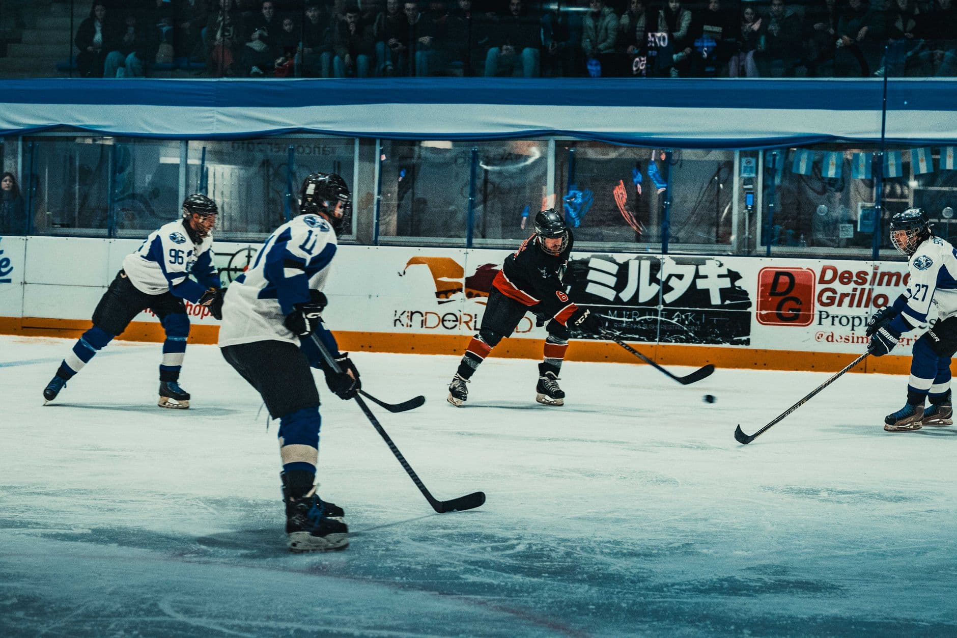 Exciting ice hockey game with players in action at a Buenos Aires ice rink.